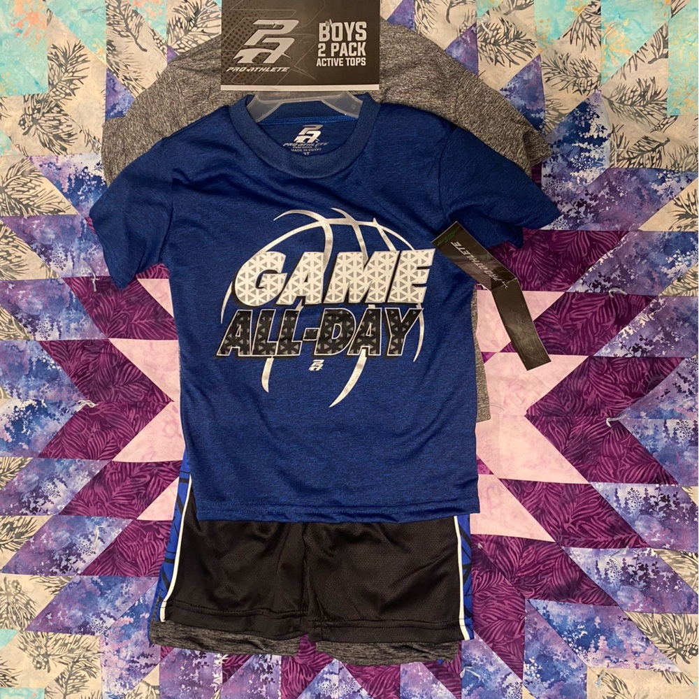 Bundle of two NWT athletic shirts and two athletic shorts. 3t.
